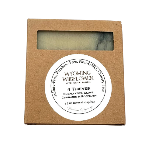 Wyoming Wildflower soap bar in a brown cardboard box with a label.