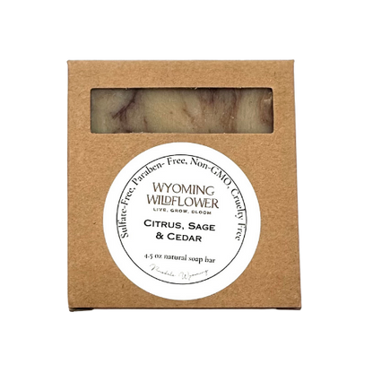 Wyoming Wildflower soap bar in a brown cardboard box with a label on a white background