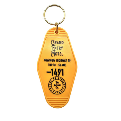 Yellow keychain with black text and logo on a white background