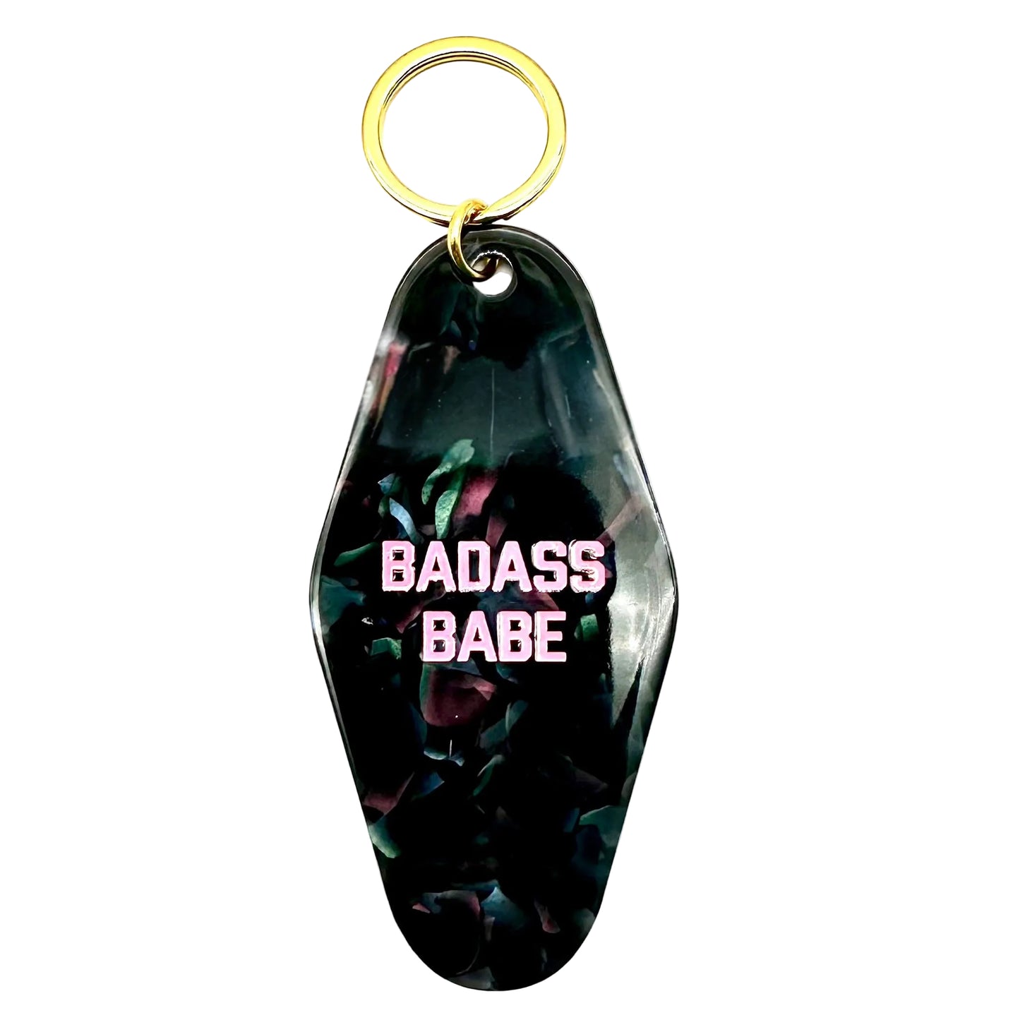 Keychain with 'BADASS BABE' text on a dark floral background