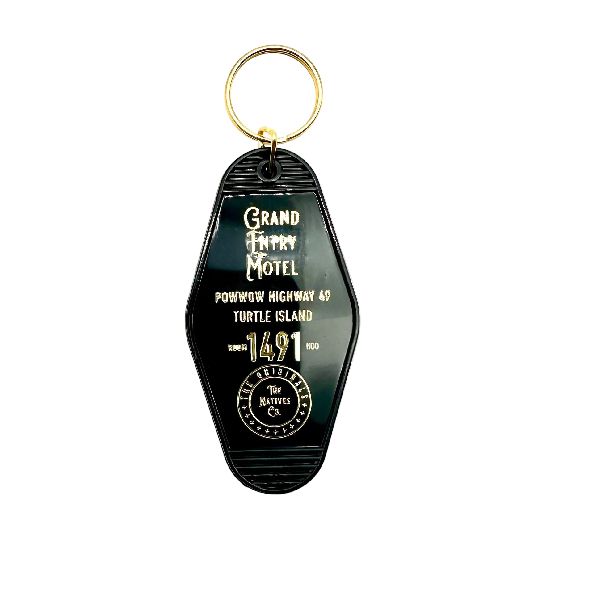 Black Keychain with 'Grand Trunk Motel' text on a white background