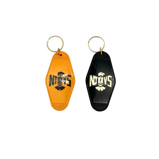 Two keychains, one yellow and one black, with a logo on a white background.