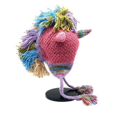 Colorful knitted hat with a pom-pom on a white background