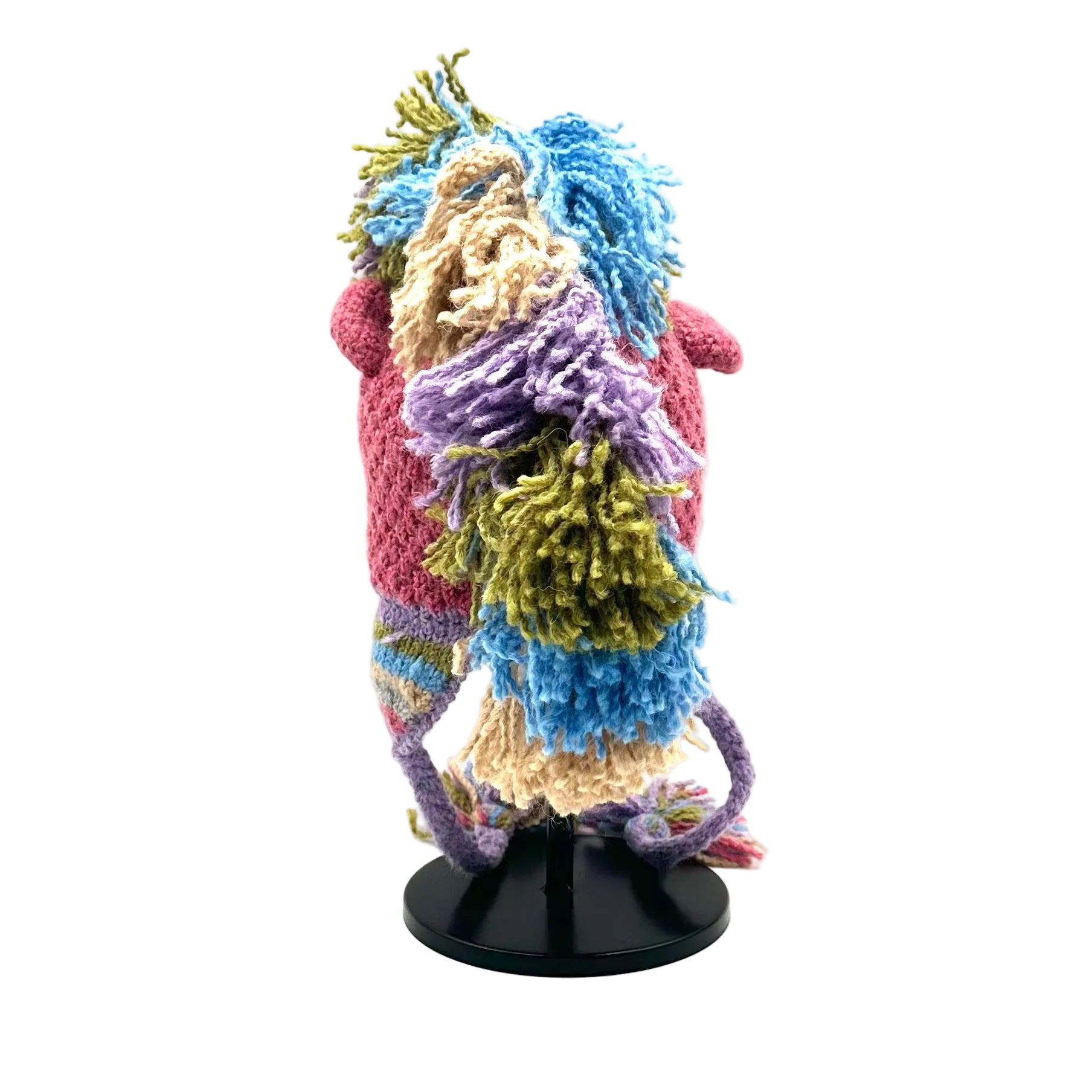 Colorful yarn sculpture on a white background