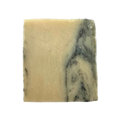 Marble-patterned soap bar on a white background