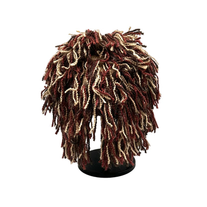 Textured brown and beige hat on a white background