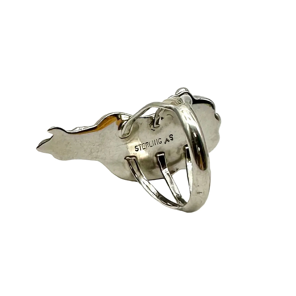 Silver earring with 'Sterling Silver' marking on a white background