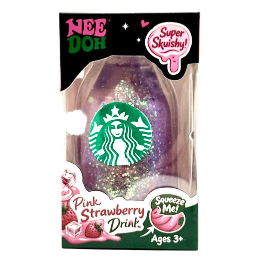 A packaged novelty toy shaped like a Starbucks-style bottle with a green siren logo, labeled 'Pink Strawberry Drink,' in retail packaging with text including 'Nee Doh,' 'Super Skuishy!,' and 'Squeeze Me! Ages 3+'.